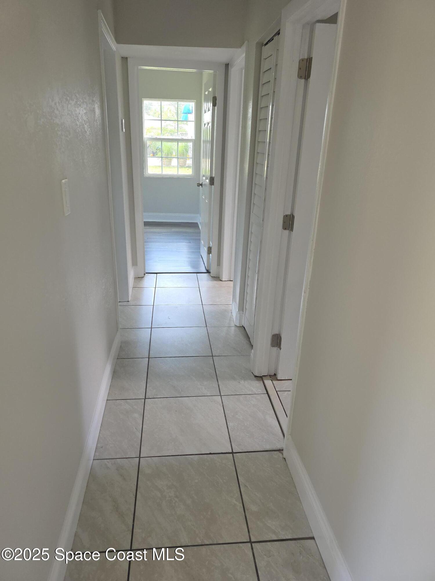 413 Dove Avenue Rockledge, FL 32955 - Photo 3 of 10 a view of entryway with stairs
