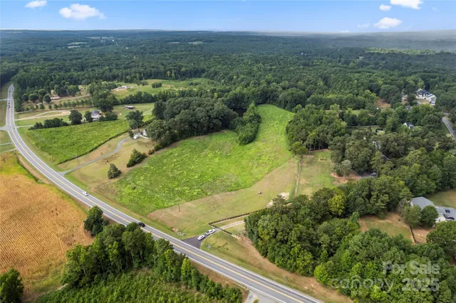 an aerial view of a golf course with outdoor space