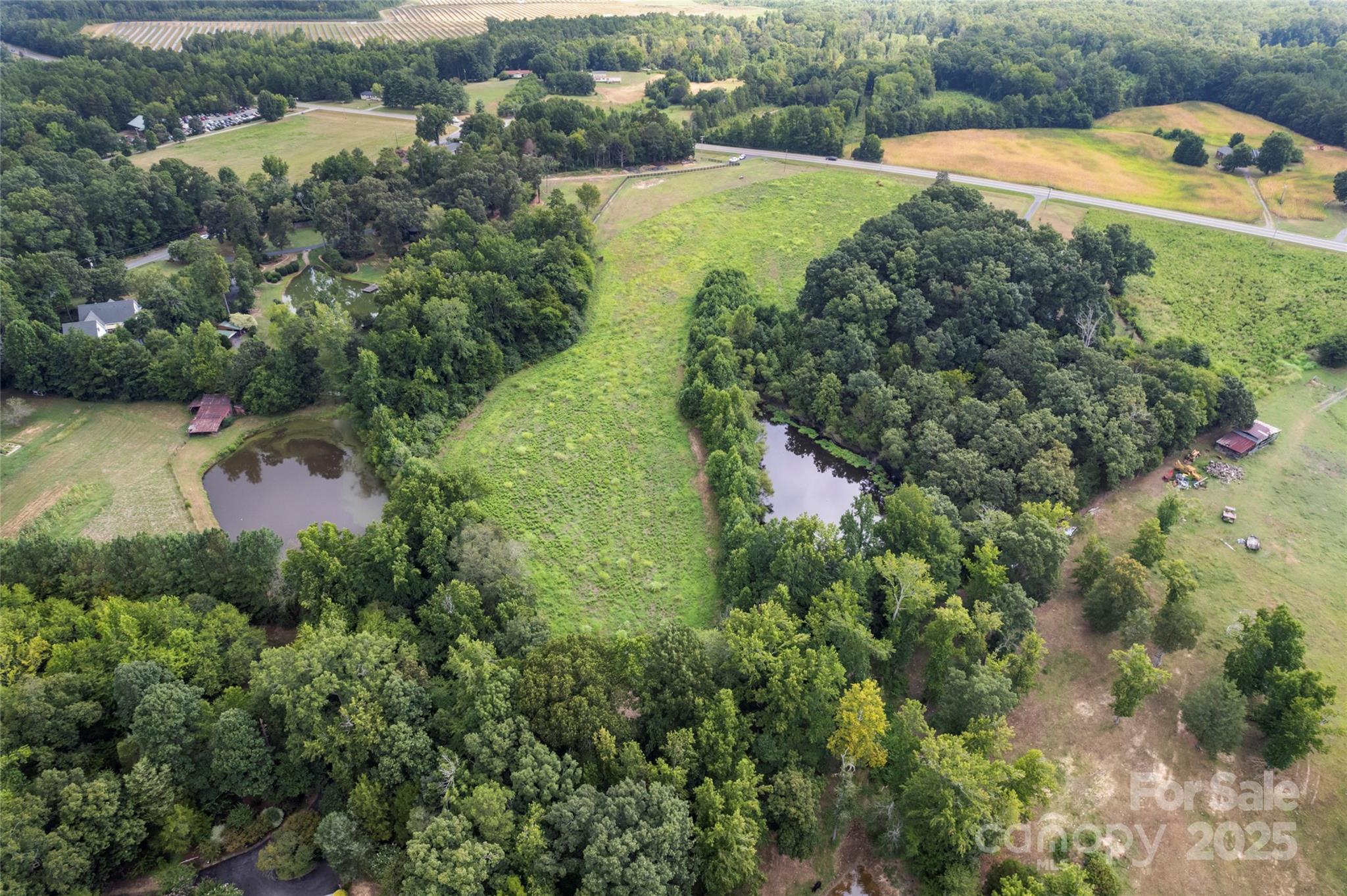 0 Us Highway Midland, NC 28107 - Photo 5 of 15 an aerial view of a house with a yard and lake view