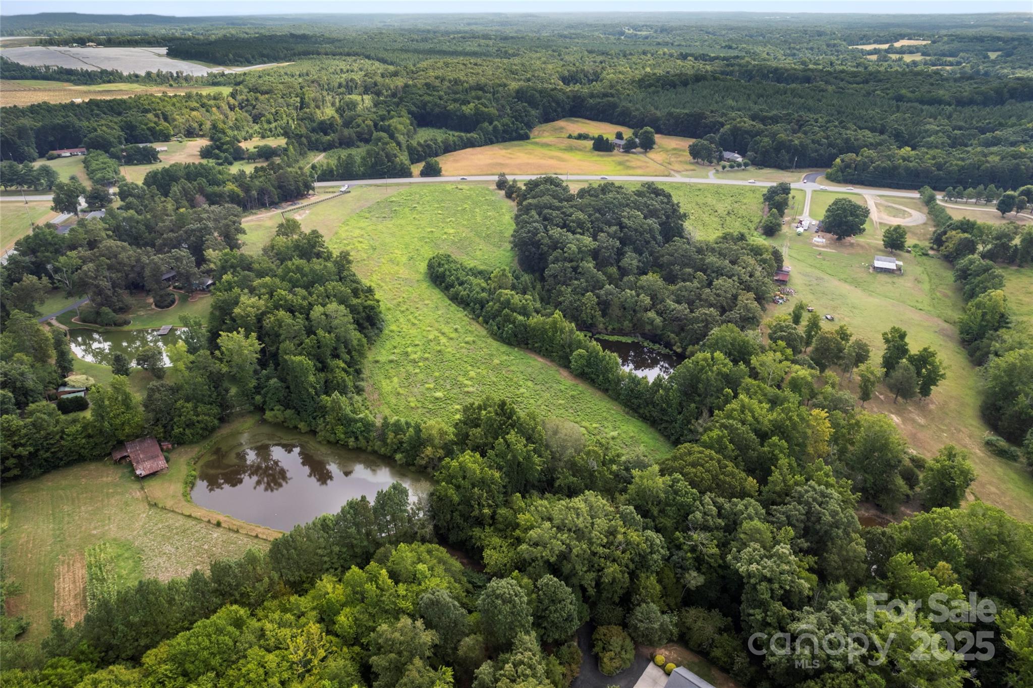 0 Us Highway Midland, NC 28107 - Photo 8 of 15 an aerial view of a house with a yard