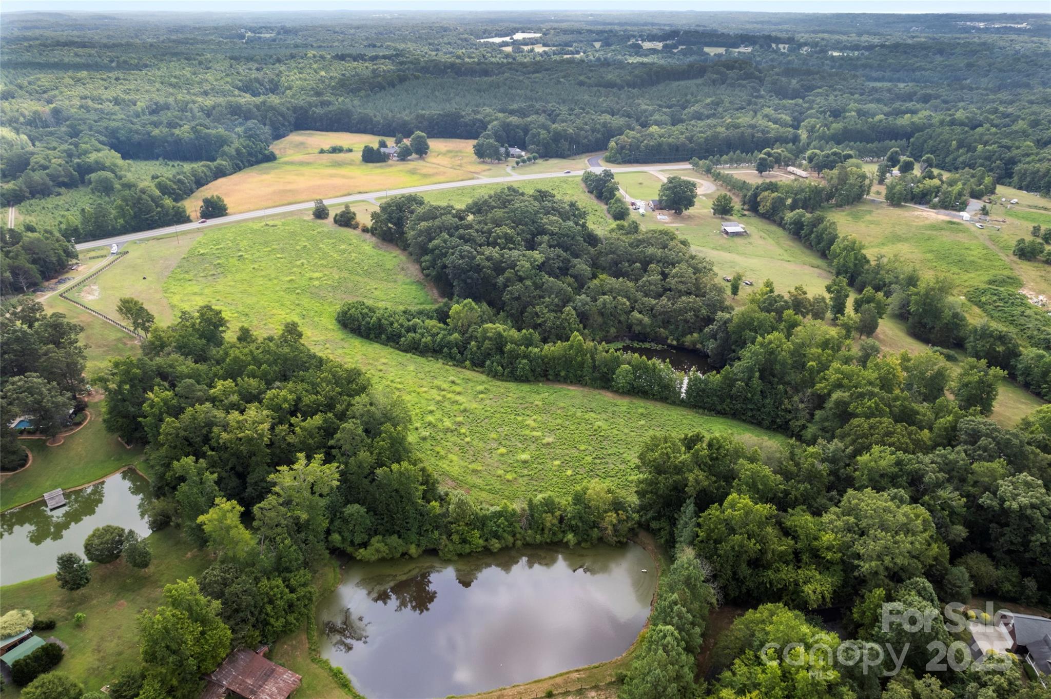 0 Us Highway Midland, NC 28107 - Photo 9 of 15 an aerial view of residential houses with outdoor space