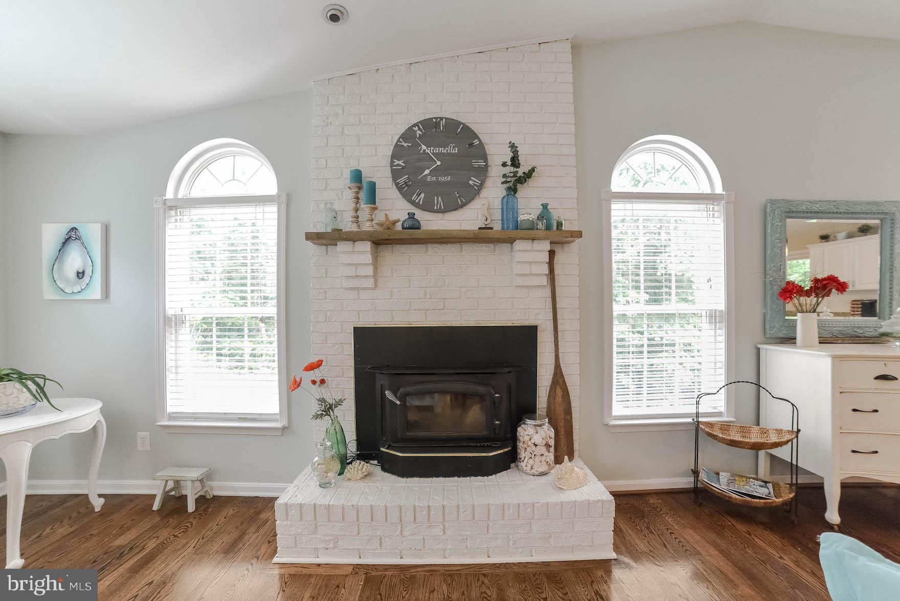 11131 Rawhide Road Lusby, MD 20657 - Photo 5 of 56 Brick Fireplace w/ wood burning insert
