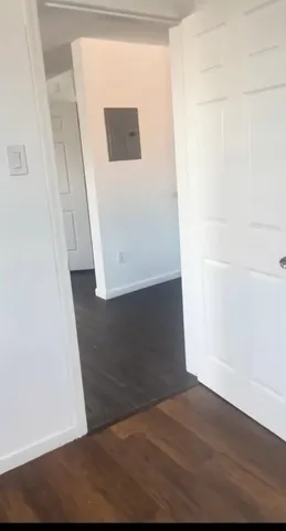 a view of a hallway with staircase