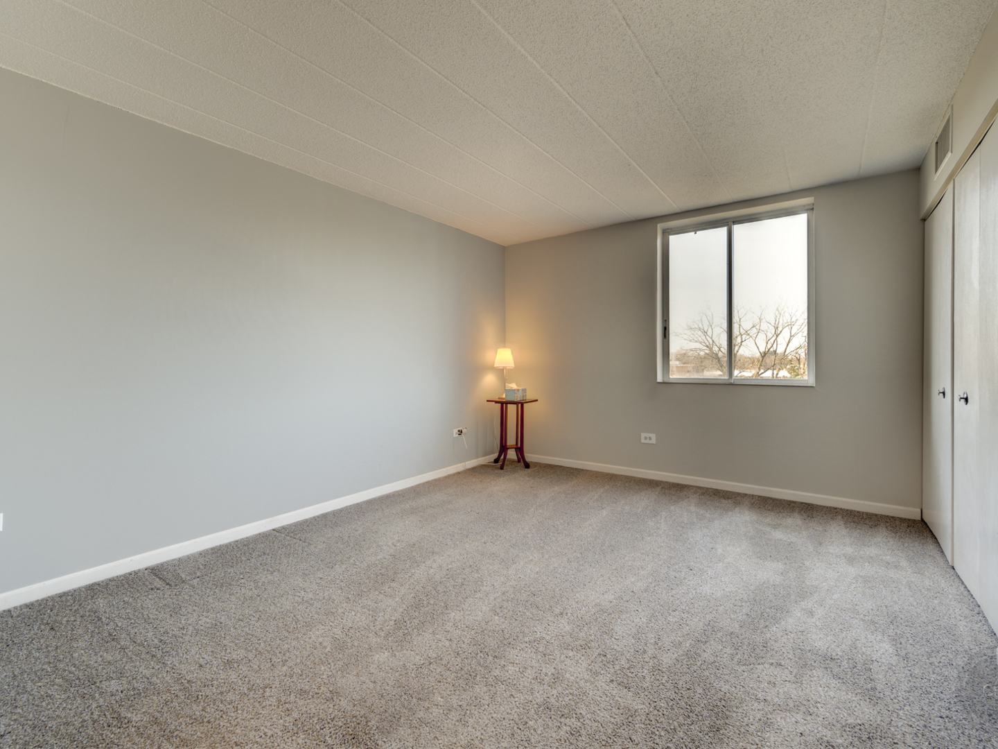 100 West Butterfield Road, Unit 405N Elmhurst, IL 60126 - Photo 16 of 27 an empty room with windows