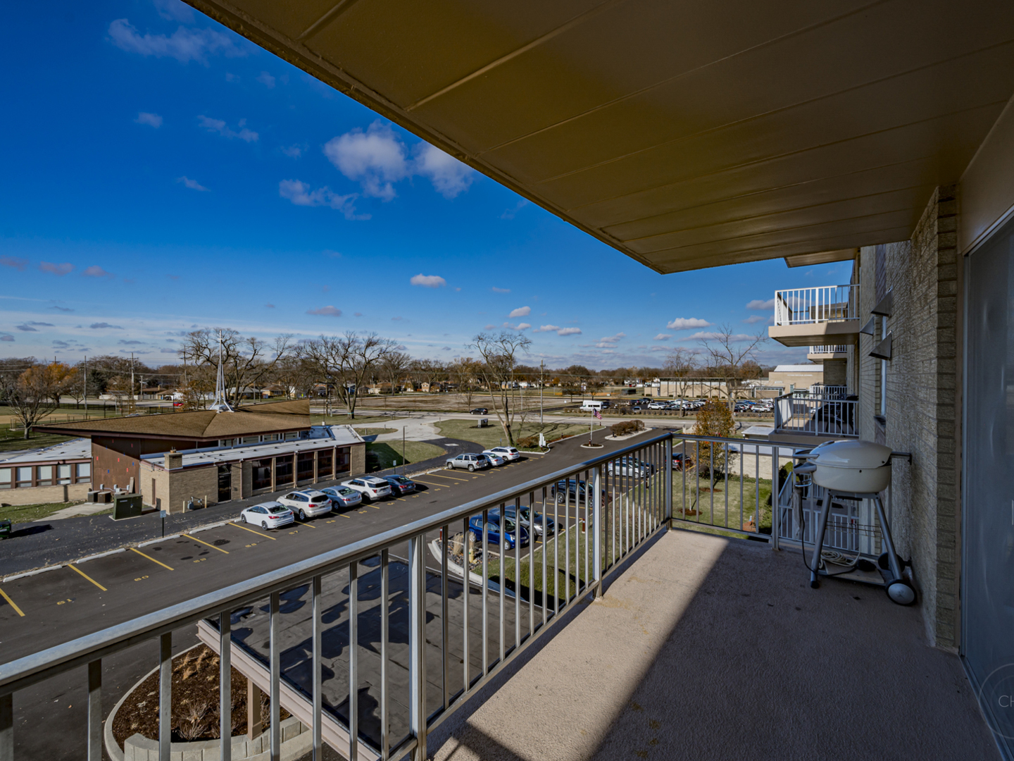 100 West Butterfield Road, Unit 405N Elmhurst, IL 60126 - Photo 21 of 27 a view of city from balcony