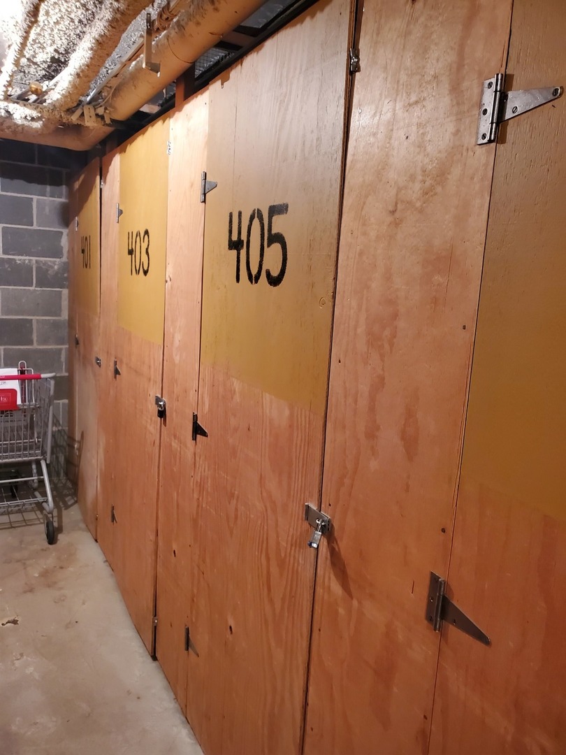 100 West Butterfield Road, Unit 405N Elmhurst, IL 60126 - Photo 22 of 27 a view of a hallway with wooden walls