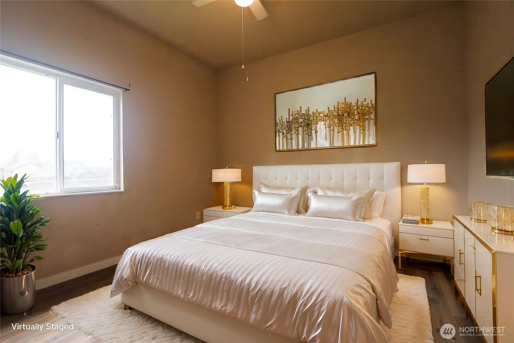 912 Ramer Avenue Hoquiam, WA 98550 - Photo 12 of 20 a bedroom with a bed and a potted plant