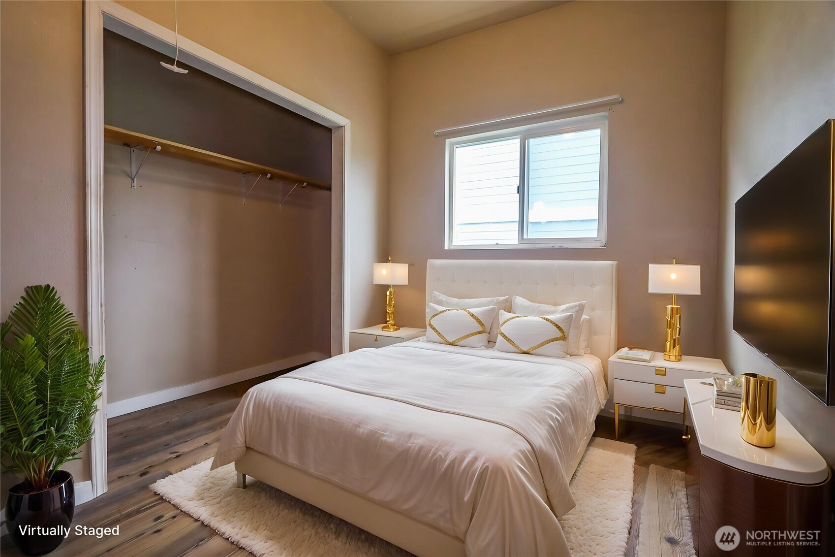 912 Ramer Avenue Hoquiam, WA 98550 - Photo 14 of 20 a bedroom with a bed and a flat screen tv