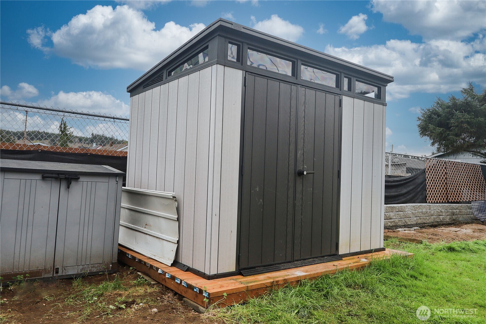 912 Ramer Avenue Hoquiam, WA 98550 - Photo 17 of 20 a view of a house with a backyard