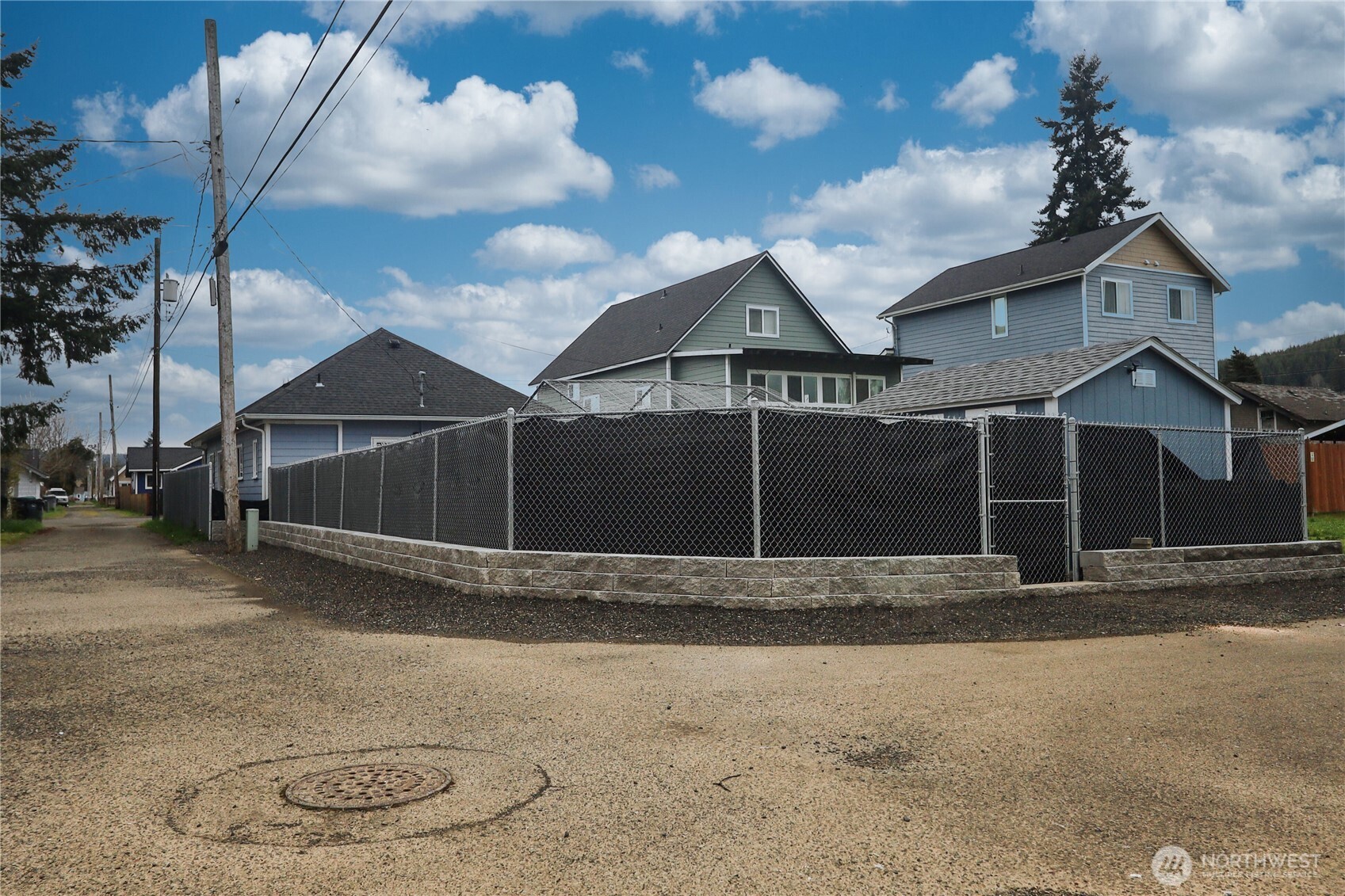 912 Ramer Avenue Hoquiam, WA 98550 - Photo 20 of 20 a view of wooden house with a yard