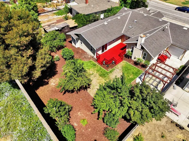 an aerial view of a garden with lots of residential buildings