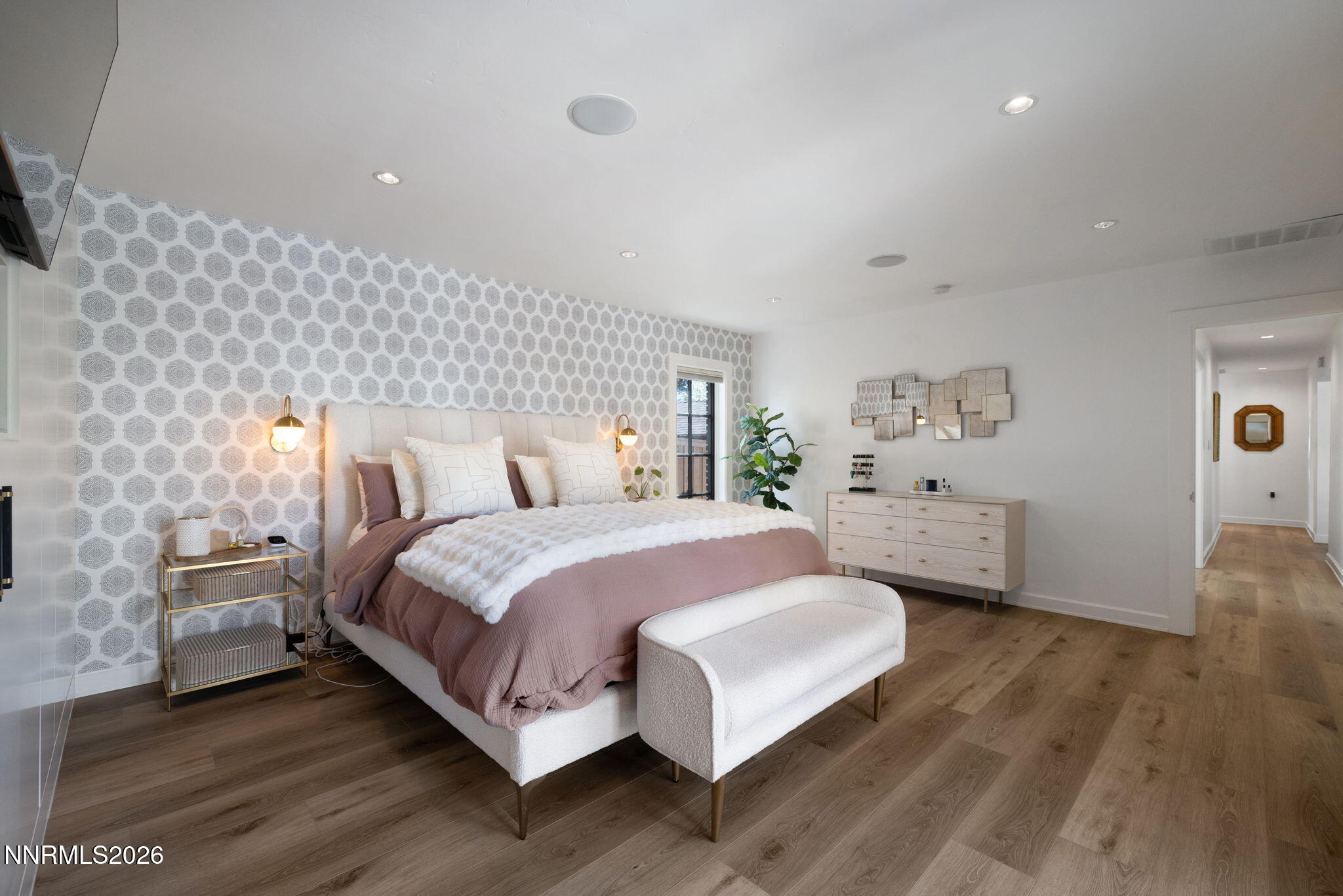 210 Bret Harte Avenue Reno, NV 89509 - Photo 12 of 40 a spacious bedroom with a bed and a cabinets