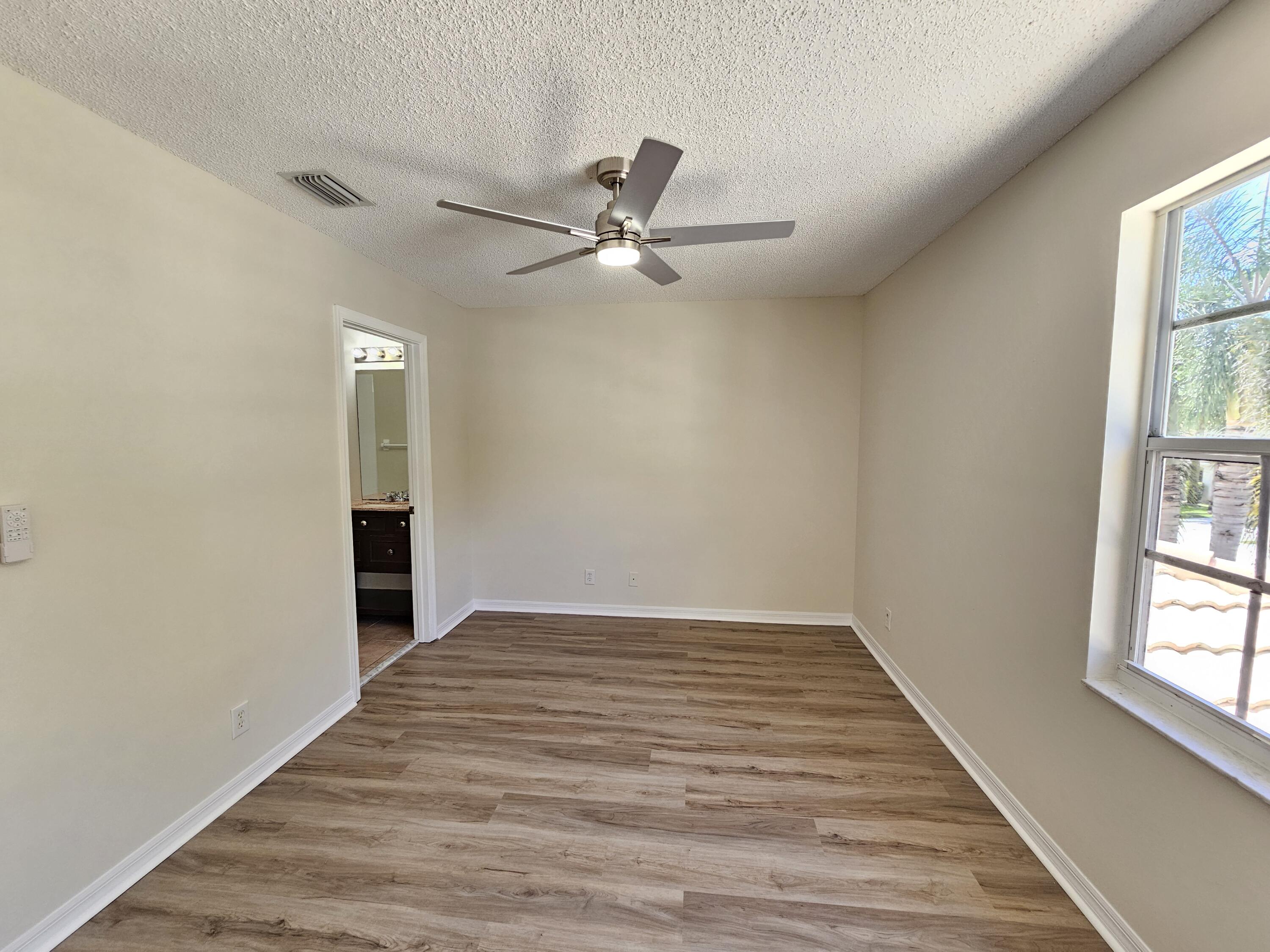 145 Fox Meadow Run Jupiter, FL 33458 - Photo 21 of 30 Bedroom 2 (2)