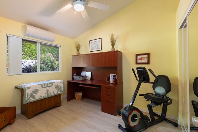 a bedroom with bed and a window