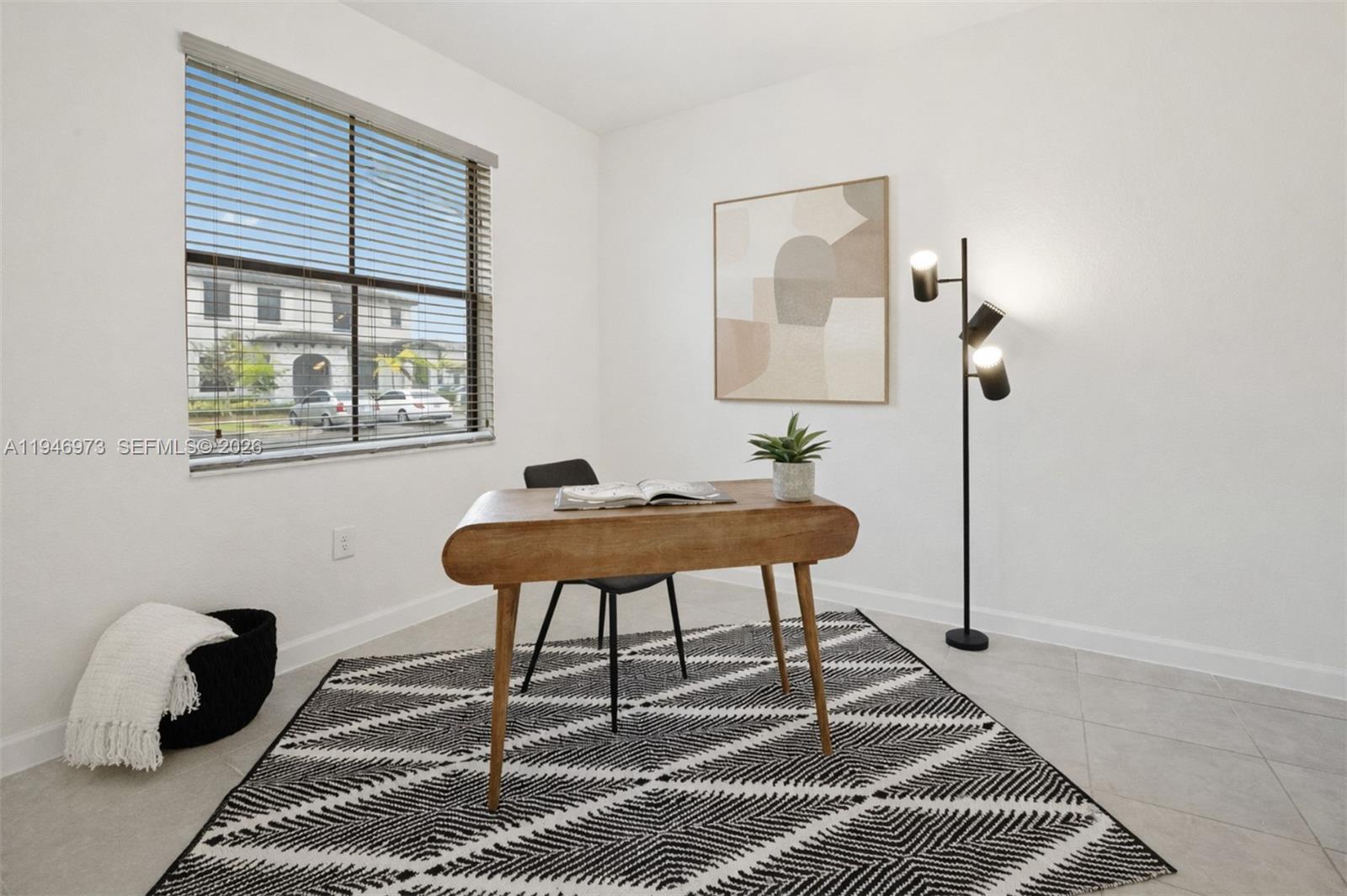 13236 Southwest 286th Street Homestead, FL 33033 - Photo 4 of 23 a workspace with furniture and a window