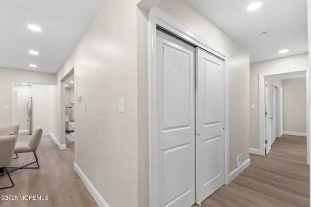 a bedroom with double bed and a window