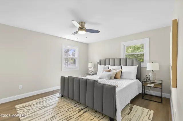 a bedroom with a bed and cabinets