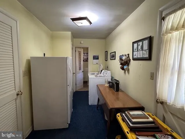 a bathroom with a toilet a sink and view