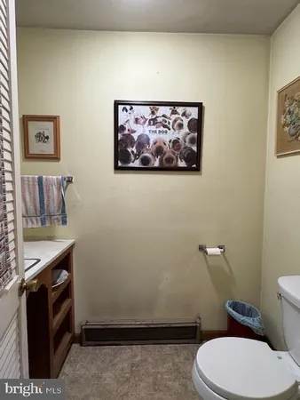 a room with furniture and wooden floor