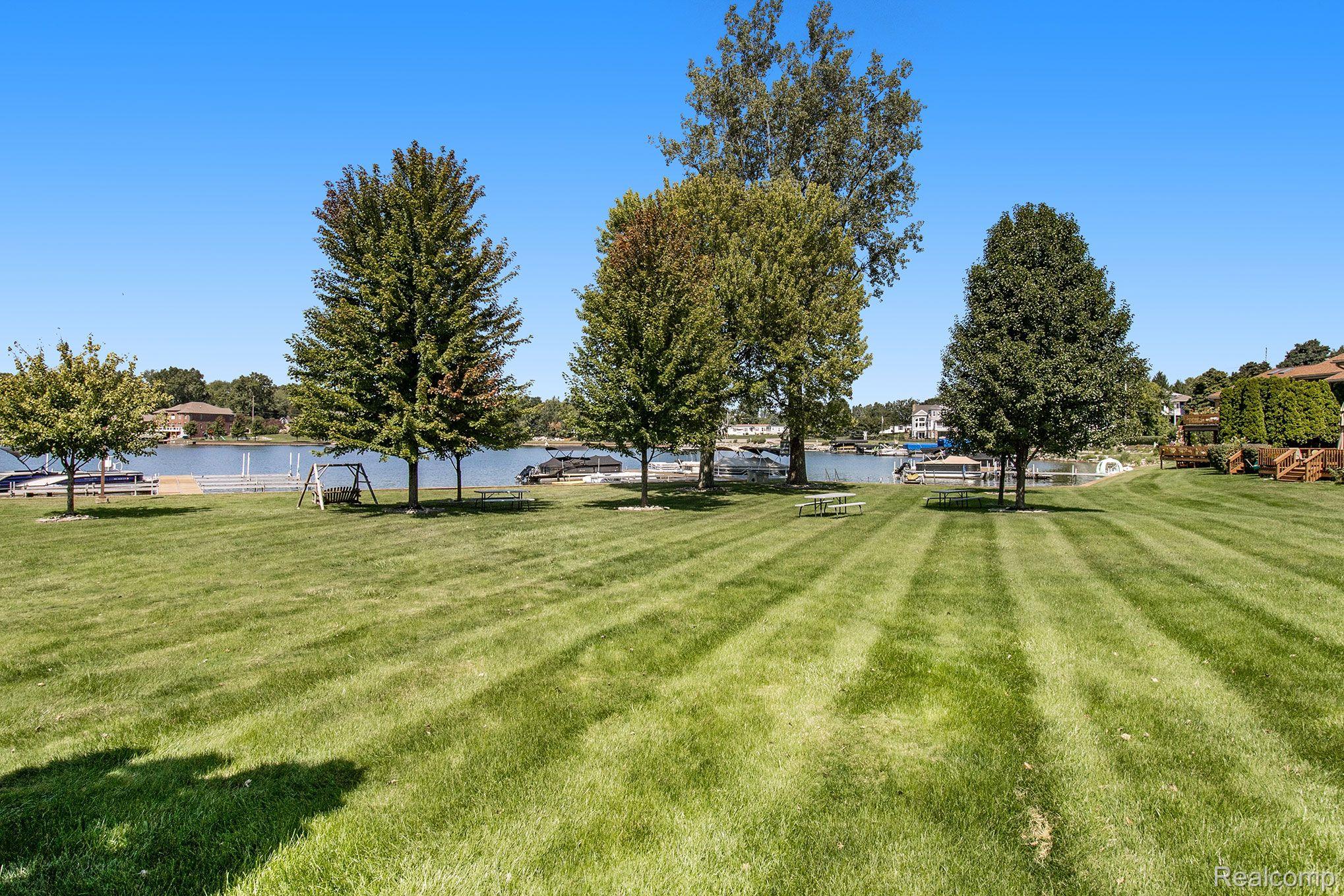 Lake Fenton waterfront view from deck & back yard