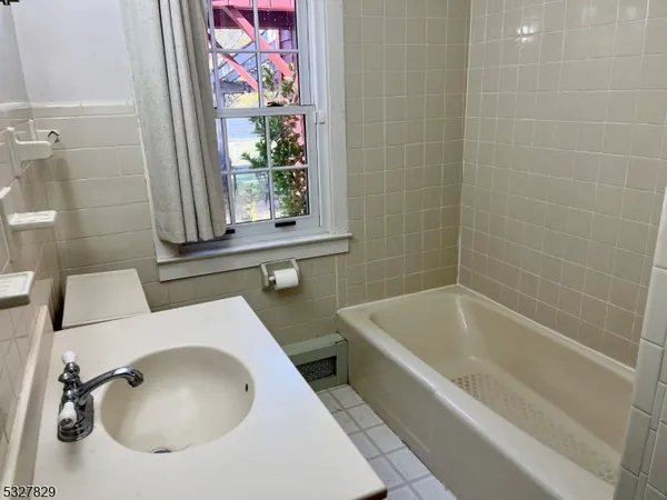 a bathroom with a sink and a bathtub