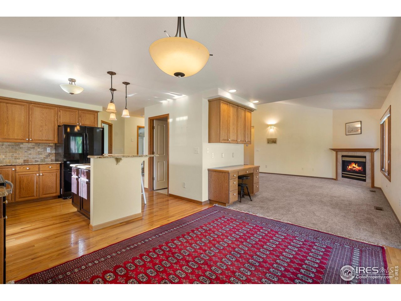 4467 West 17th Street Greeley, CO 80634 - Photo 15 of 48 a view of living room and kitchen