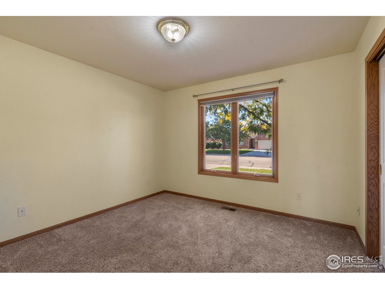 4467 West 17th Street Greeley, CO 80634 - Photo 22 of 48 an empty room with windows