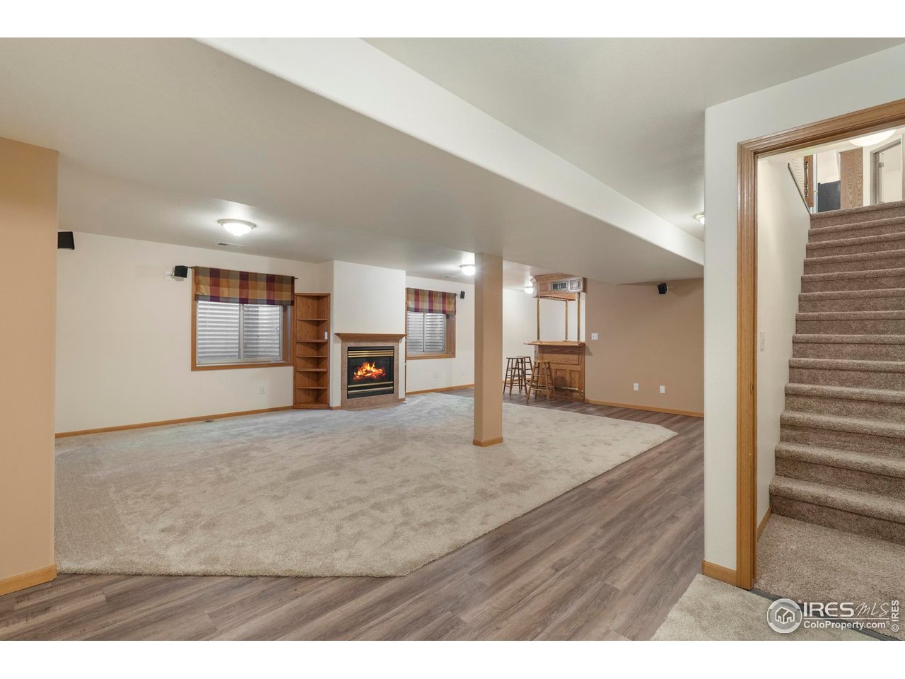 4467 West 17th Street Greeley, CO 80634 - Photo 27 of 48 a view interior of kitchen and hall with wooden floor