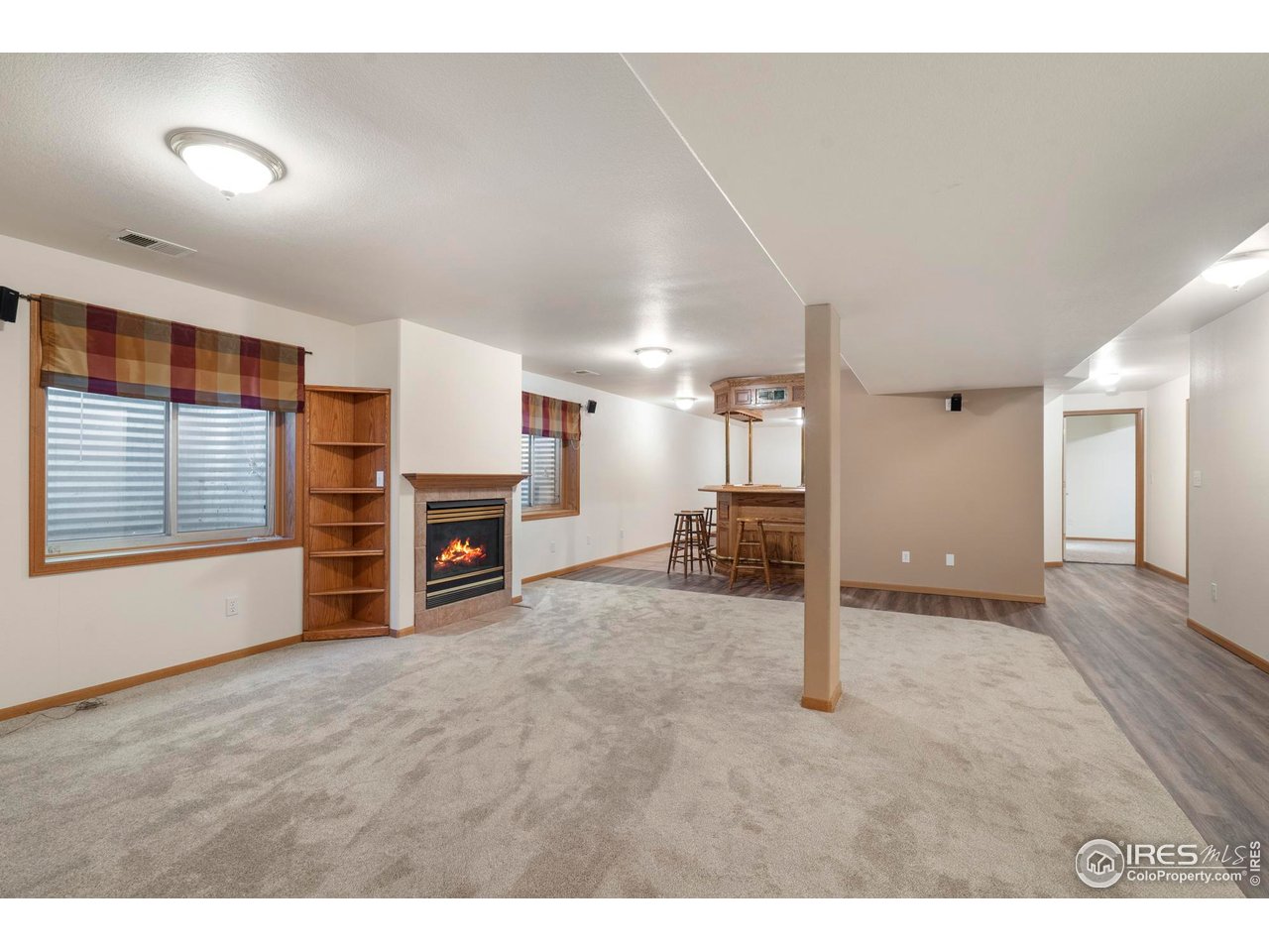4467 West 17th Street Greeley, CO 80634 - Photo 29 of 48 a view of a livingroom with a fireplace