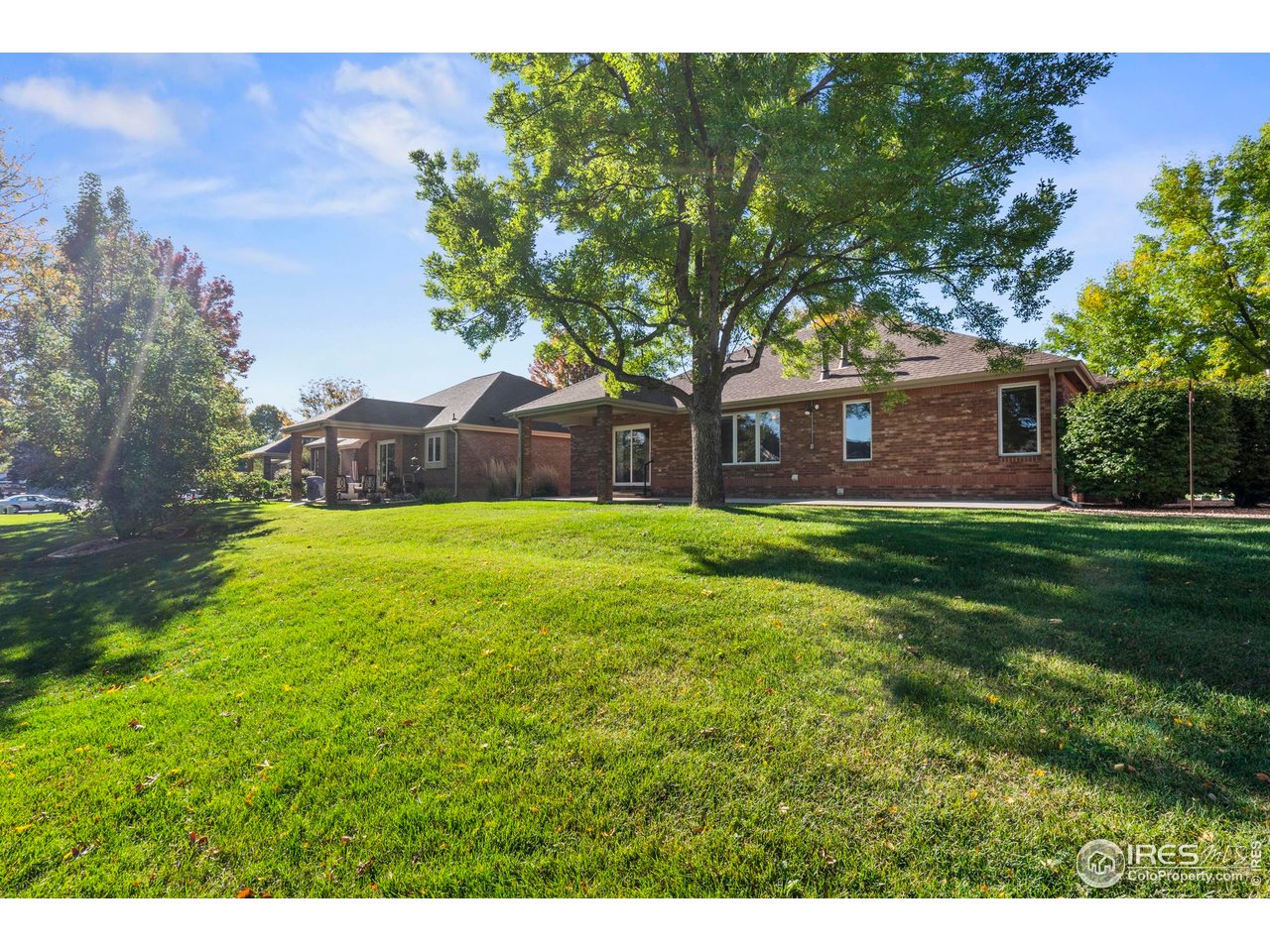 4467 West 17th Street Greeley, CO 80634 - Photo 39 of 48 a view of a house with a yard