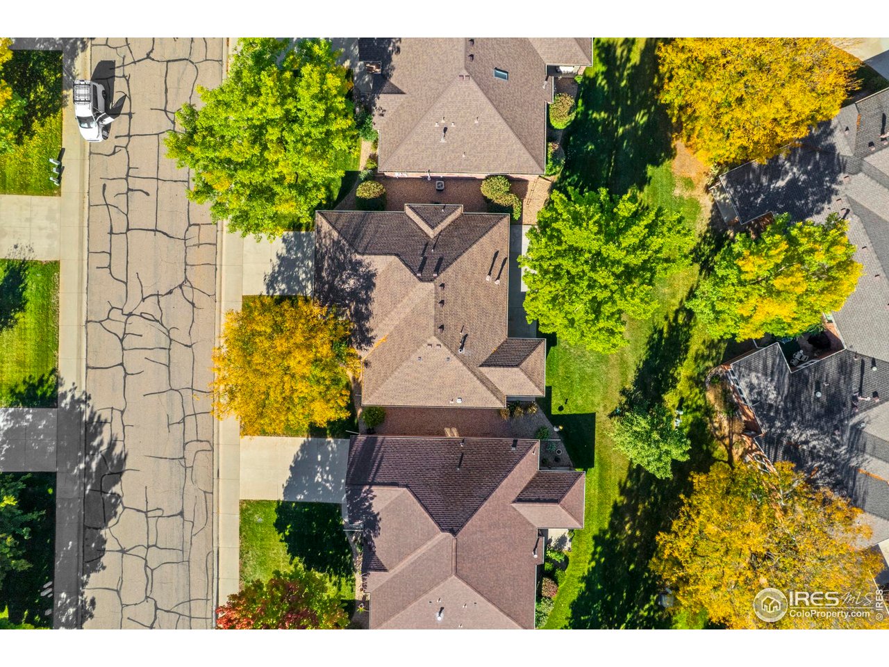 4467 West 17th Street Greeley, CO 80634 - Photo 41 of 48 an aerial view of a house with a yard basket ball court and outdoor seating