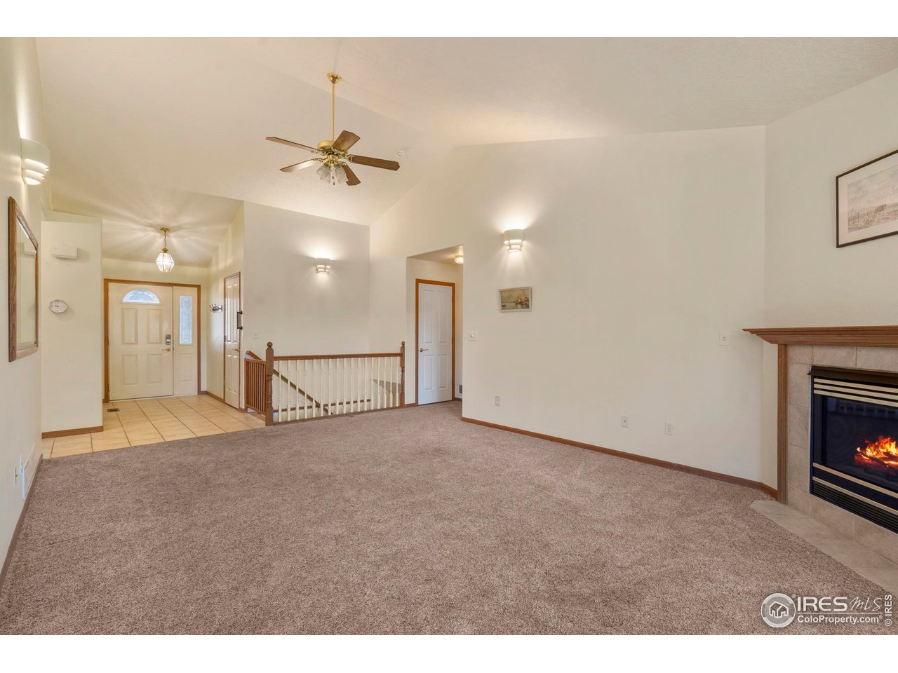 4467 West 17th Street Greeley, CO 80634 - Photo 7 of 48 a view of an empty room with a fireplace