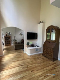 72 Pinnacle Road Ellington, CT 06029 - Photo 20 of 38 a living room with furniture and a flat screen tv