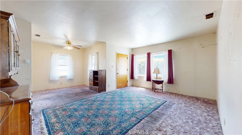 10515 Tujunga Canyon Boulevard Tujunga, CA 91042 - Photo 5 of 35 Living room towards dining area