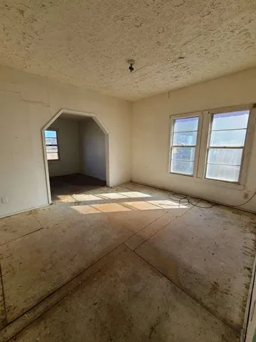 a view of an empty room and window