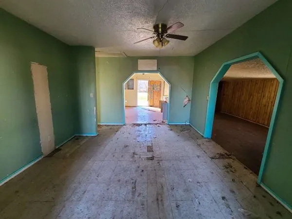 a view of a livingroom with a staircase