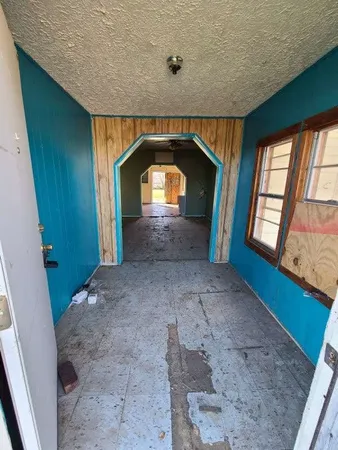 an empty room with windows