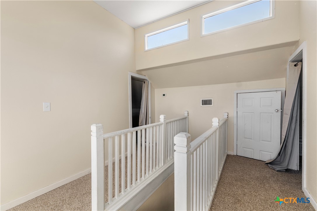 1002 East Commercial Street Victoria, TX 77901 - Photo 18 of 30 a view of a room with stairs