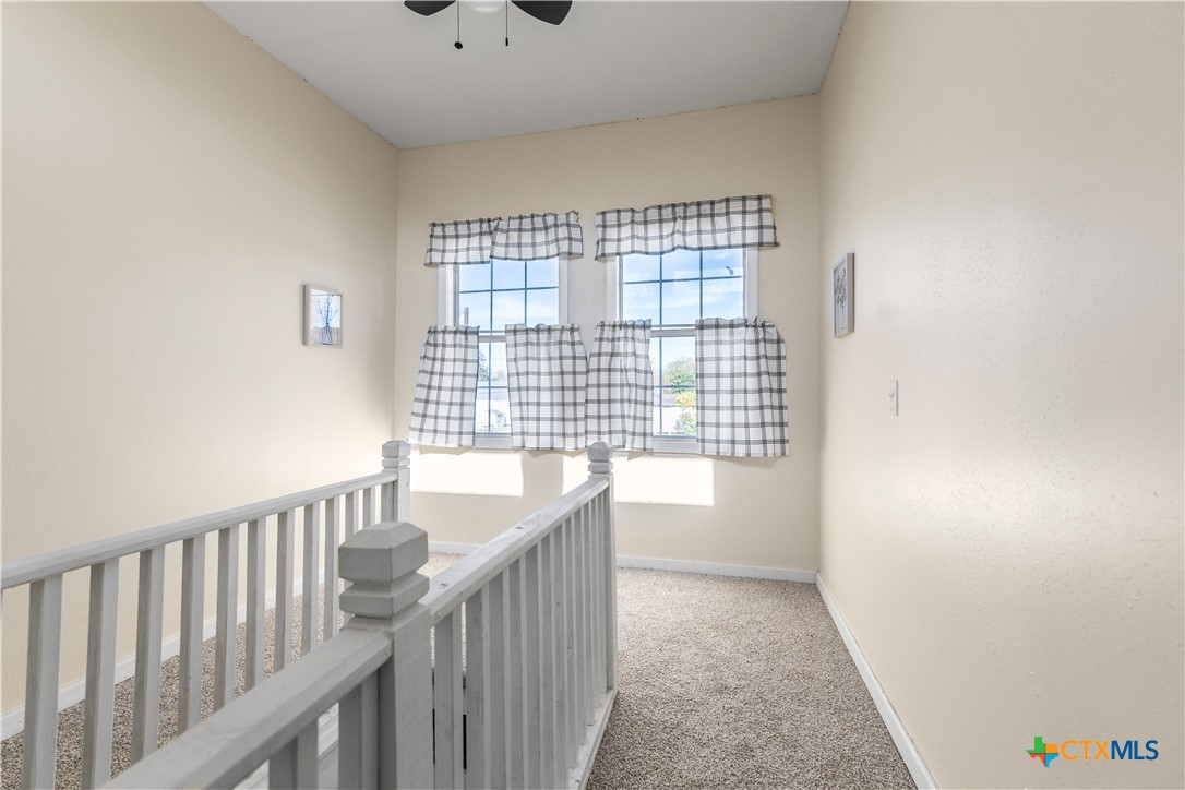 1002 East Commercial Street Victoria, TX 77901 - Photo 19 of 30 a view of hallway with windows