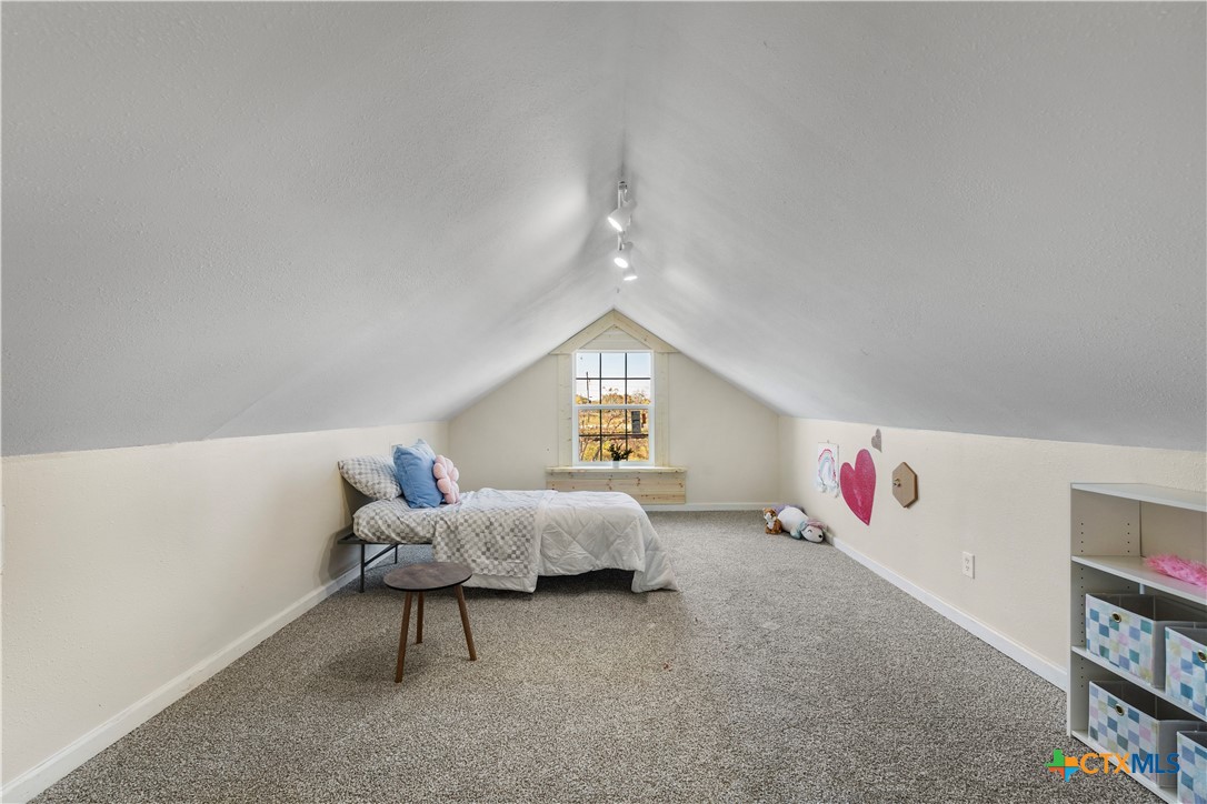 1002 East Commercial Street Victoria, TX 77901 - Photo 21 of 30 a living room with furniture and a window
