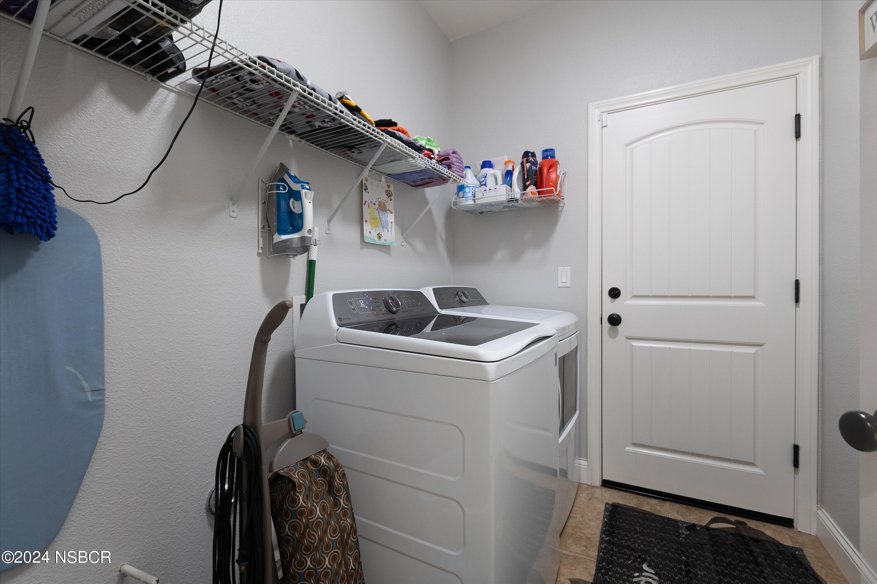 757 Pluto Avenue Lompoc, CA 93436 - Photo 11 of 41 a utility room with dryer and washer