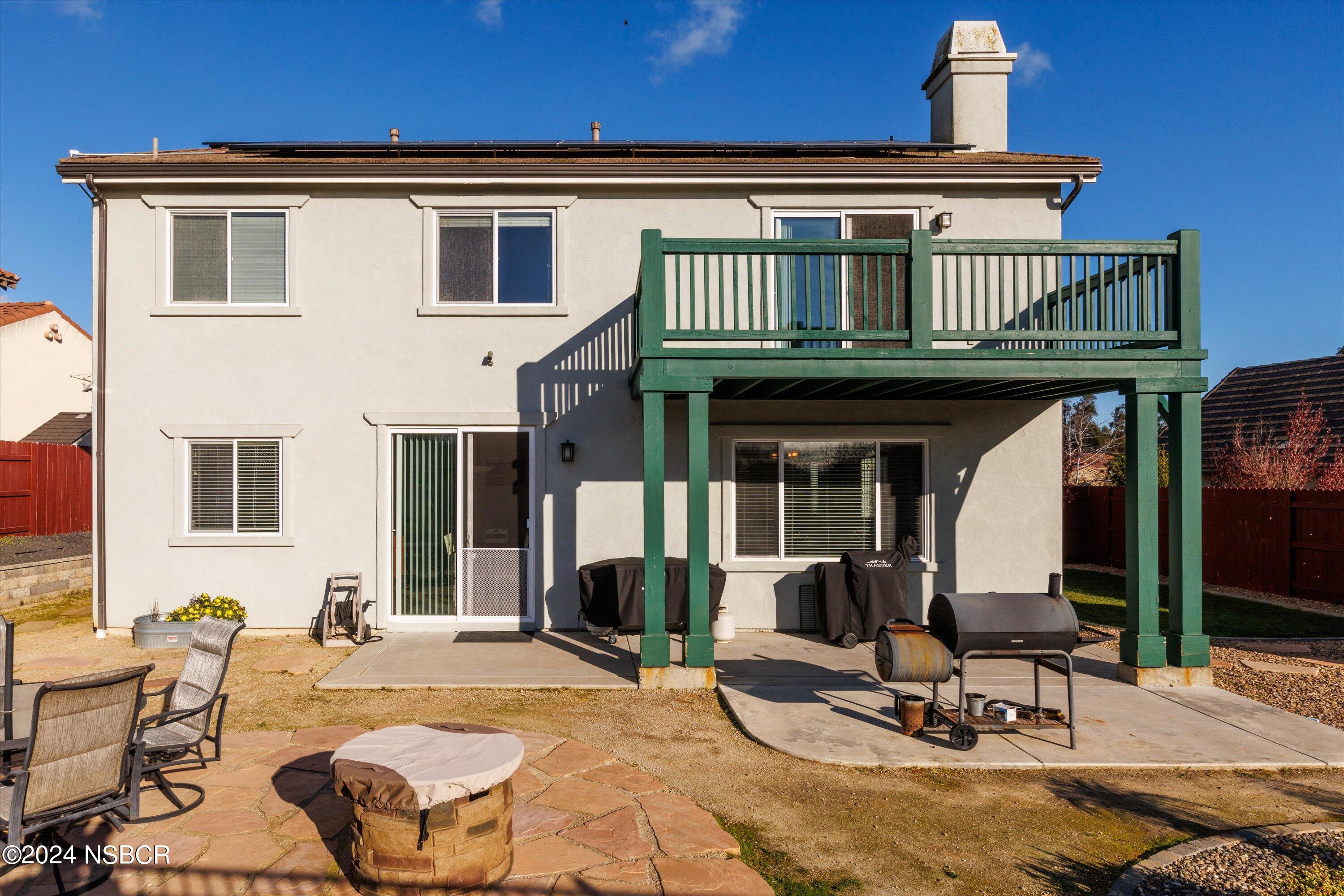 757 Pluto Avenue Lompoc, CA 93436 - Photo 19 of 41 a front view of a house with outdoor seating