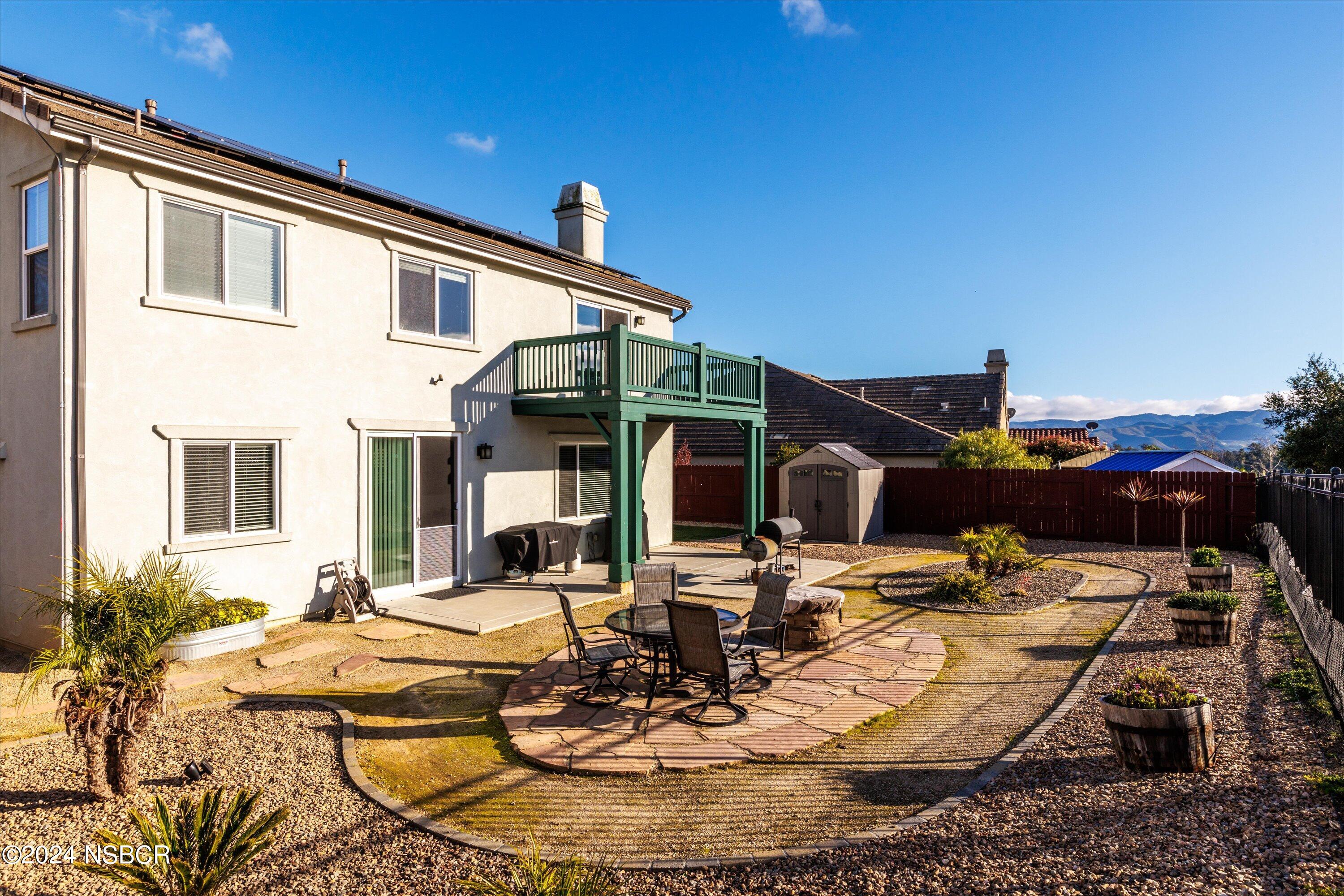 757 Pluto Avenue Lompoc, CA 93436 - Photo 20 of 41 a view of a house with swimming pool