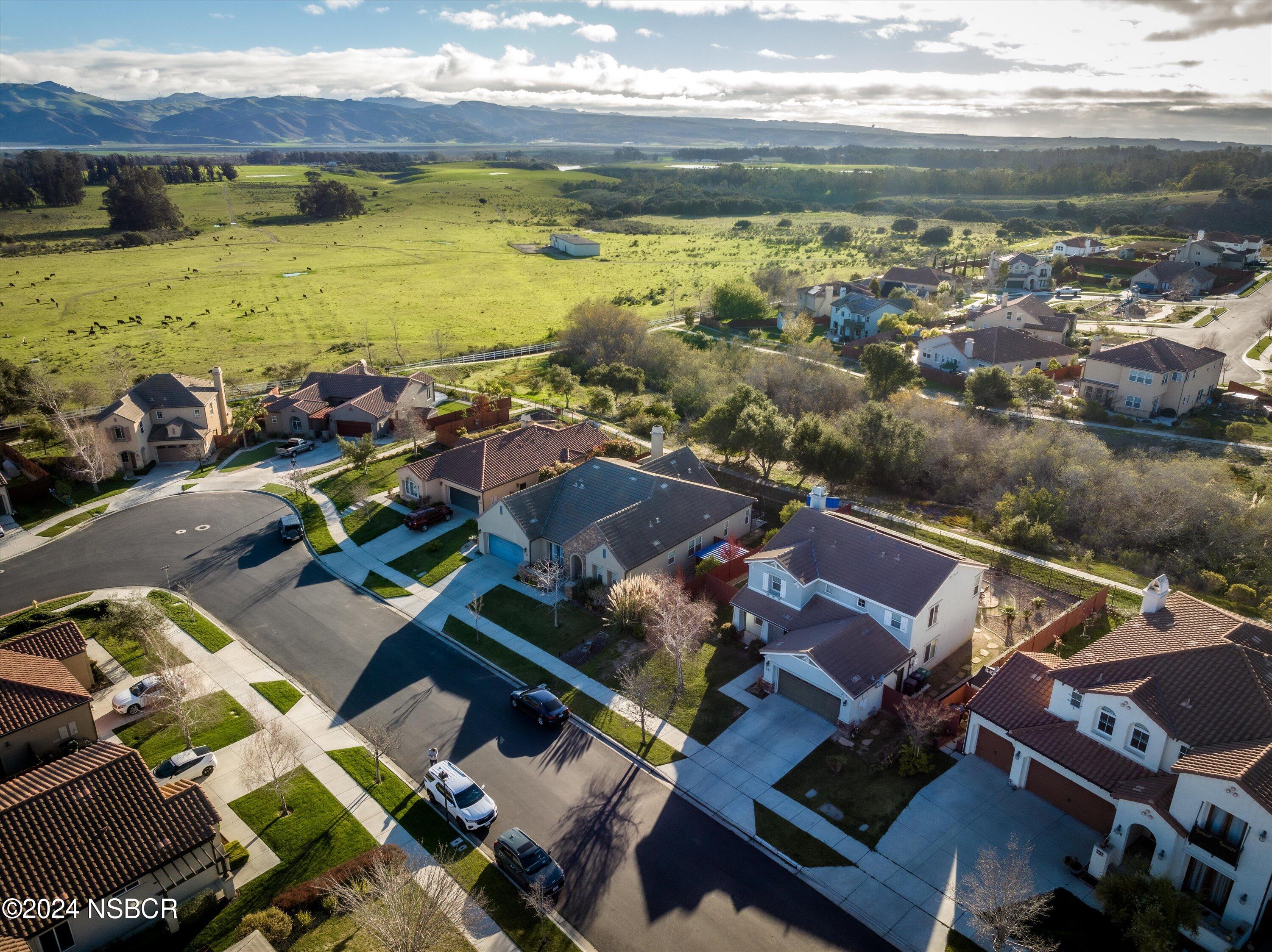 757 Pluto Avenue Lompoc, CA 93436 - Photo 30 of 41 an aerial view of residential houses with outdoor space