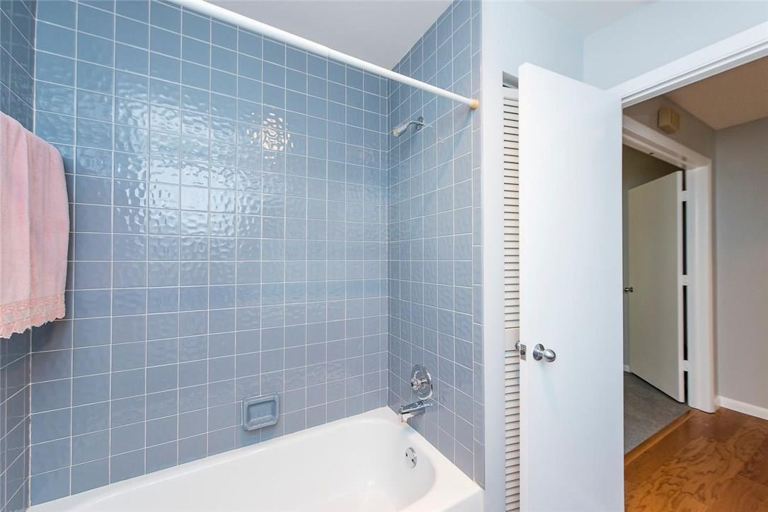 3976 Northwest 23rd Terrace Boca Raton, FL 33431 - Photo 24 of 31 a bathroom with a bathtub