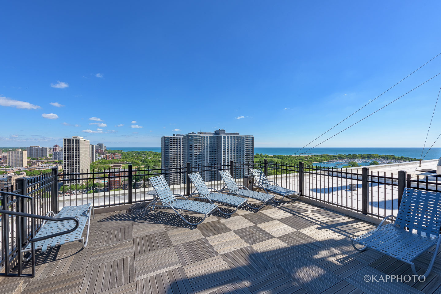 720 West Gordon Terrace, Unit 7F Chicago, IL 60613 - Photo 15 of 19 a view of a terrace with furniture and iron floor