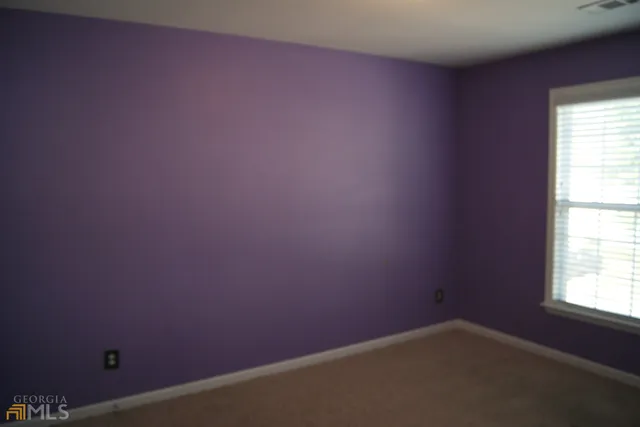 an empty room with closet