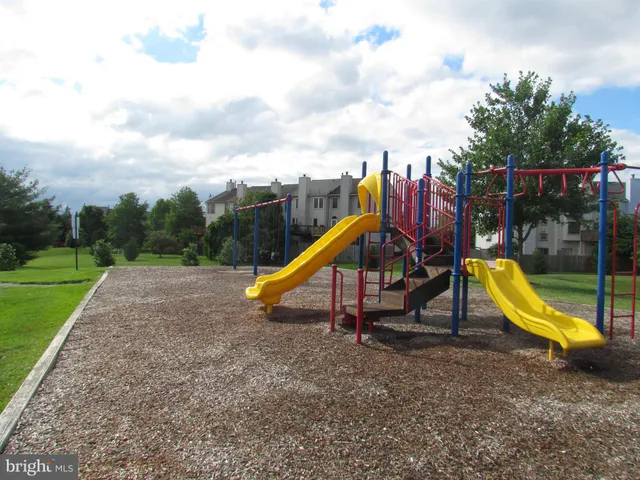 a front view of a building with street view