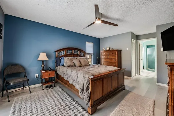 a bathroom with a double vanity sink a mirror and a shower