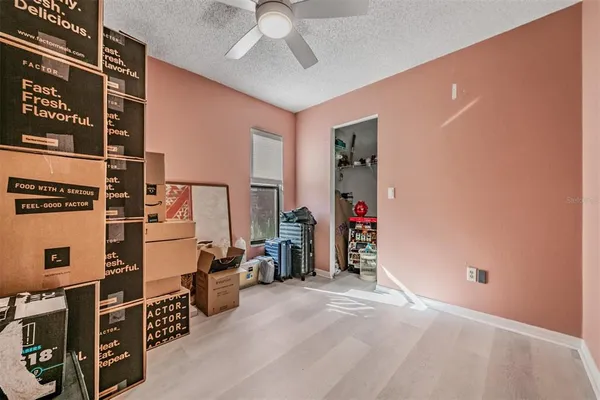 a spacious bathroom with a double vanity sink and a mirror
